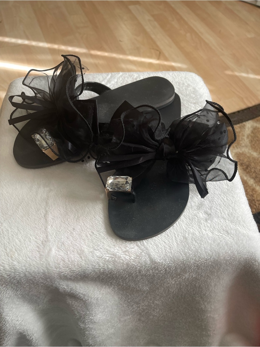 Fancy flip flops with poofy bow